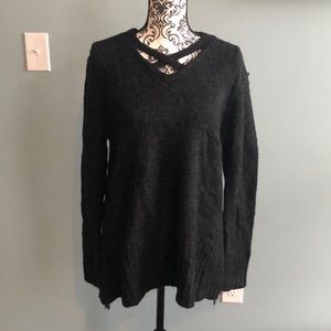 Super cute sweater with fun back!